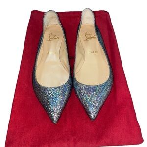 Christian Louboutin flats.